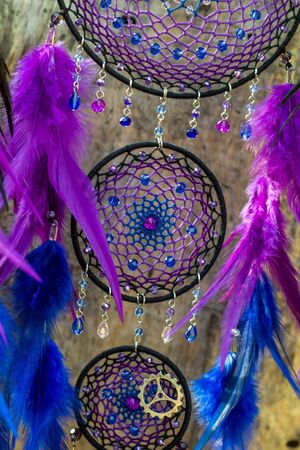 Dream catcher with feathers threads and beads rope hanging. Dreamcatcher handmadeの写真素材