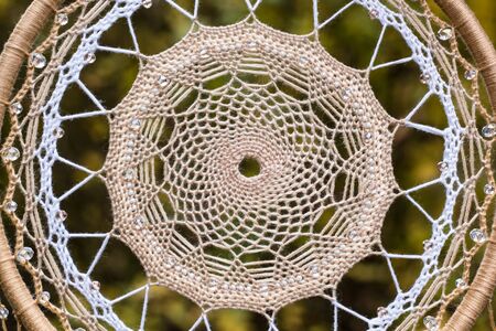 Dream catcher with feathers threads and beads rope hanging. Dreamcatcher handmadeの写真素材