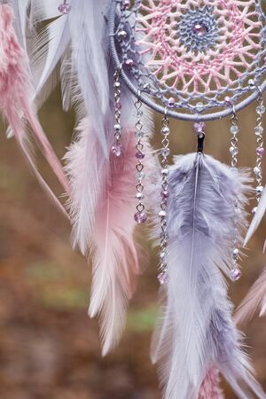 Dream catcher with feathers threads and beads rope hanging. Dreamcatcher handmadeの写真素材
