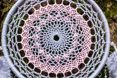 Dream catcher with feathers threads and beads rope hanging. Dreamcatcher handmade
