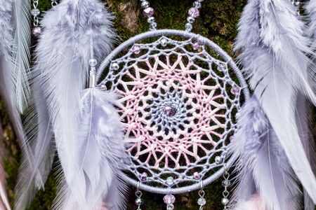 Dream catcher with feathers threads and beads rope hanging. Dreamcatcher handmadeの写真素材