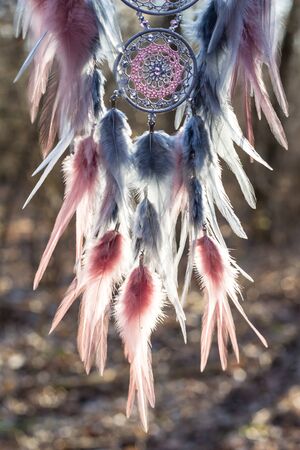 Dream catcher with feathers threads and beads rope hanging. Dreamcatcher handmadeの写真素材