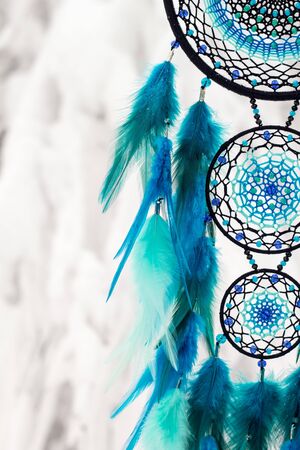 Dream catcher with feathers threads and beads rope hanging. Dreamcatcher handmadeの写真素材