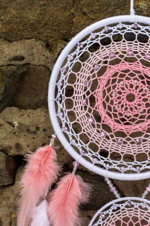 Dream catcher with feathers threads and beads rope hanging. Dreamcatcher handmadeの写真素材