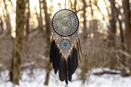 Dream catcher with feathers threads and beads rope hanging. Dreamcatcher handmadeの写真素材