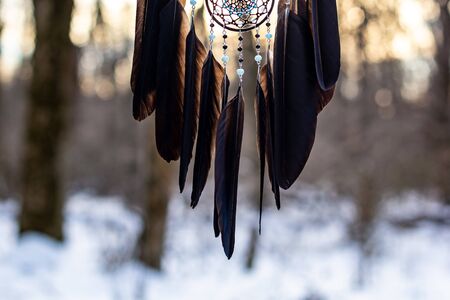 Dream catcher with feathers threads and beads rope hanging. Dreamcatcher handmadeの写真素材