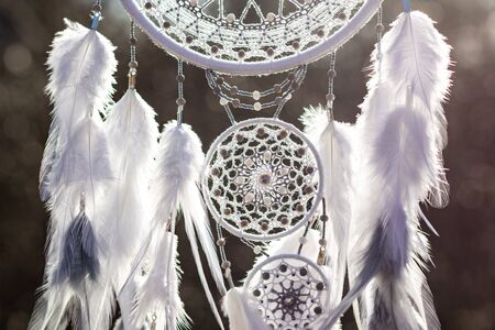 Dream catcher with feathers threads and beads rope hanging. Dreamcatcher handmade