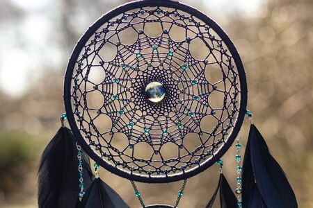 Dream catcher with feathers threads and beads rope hanging. Dreamcatcher handmade