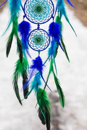 Dream catcher with feathers threads and beads rope hanging. Dreamcatcher handmadeの写真素材