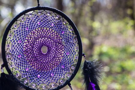 Dream catcher with feathers threads and beads rope hanging. Dreamcatcher handmadeの写真素材