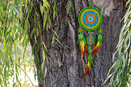 Dream catcher with feathers threads and beads rope hanging. Dreamcatcher handmade