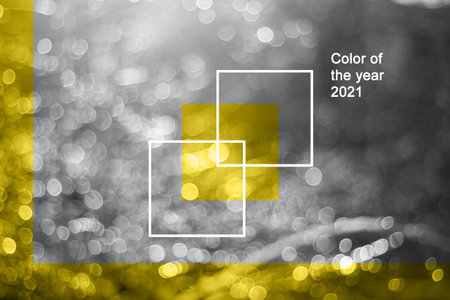 winter snow blurred background in city park, snowfall in forest, tree branches and bushes covered with snow, abstract snowflakes in blur. Color of the year 2021の写真素材