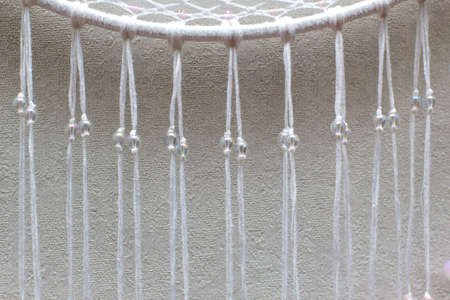 Dream catcher with feathers threads and beads rope hanging. Dreamcatcher handmade