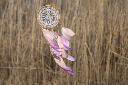 Dream catcher with feathers threads and beads rope hanging. Dreamcatcher handmade