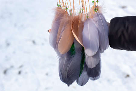 Dream catcher with feathers threads and beads rope hanging. Dreamcatcher handmade