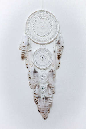 Dream catcher with feathers threads and beads rope hanging. Dreamcatcher handmade