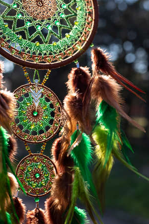 Dream catcher with feathers threads and beads rope hanging. Dreamcatcher handmadeの写真素材