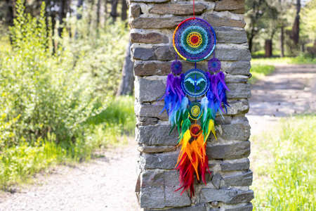 Dream catcher with feathers threads and beads rope hanging. Dreamcatcher handmade