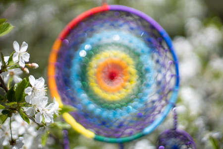 Blurred image, dream catcher native american in the wind with sunlight and blurred bokeh. White...