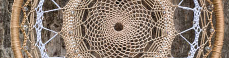 banner of Dream catcher with feathers threads and beads rope hanging. Dreamcatcher handmade