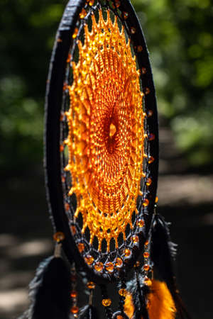 Dream catcher with feathers threads and beads rope hanging. Dreamcatcher handmadeの写真素材