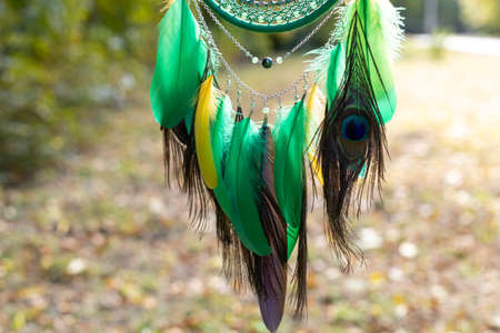 Dream catcher with feathers threads and beads rope hanging. Dreamcatcher handmadeの写真素材