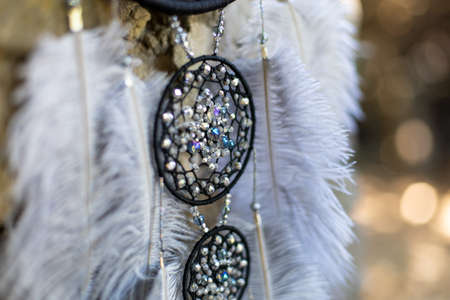 Dream catcher with feathers threads and beads rope hanging. Dreamcatcher handmadeの写真素材