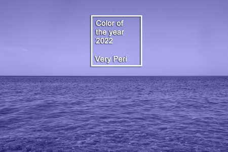 Calm Blue sea waves soft surface Ocean And Blue Sky in very peri trendy color of the year 2022. background. Color of the year 2022.の写真素材