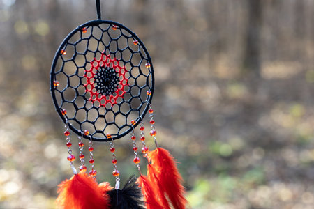 Dream catcher with feathers threads and beads rope hanging. Dreamcatcher handmade