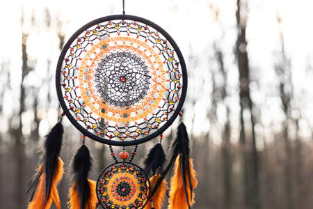 Dream catcher with feathers threads and beads rope hanging. Dreamcatcher handmade