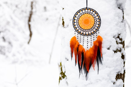 Dream catcher with feathers threads and beads rope hanging. Dreamcatcher handmadeの写真素材