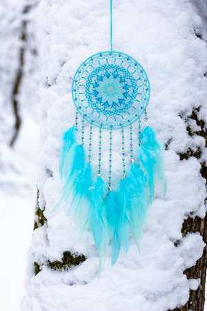 Dream catcher with feathers threads and beads rope hanging. Dreamcatcher handmadeの写真素材