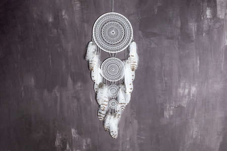 Dream catcher with feathers threads and beads rope hanging. Dreamcatcher handmadeの写真素材