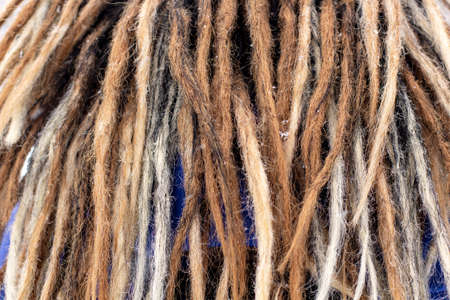Background of artificial ombre dreadlocks. Close up dreadlocks texture in natural color for your...