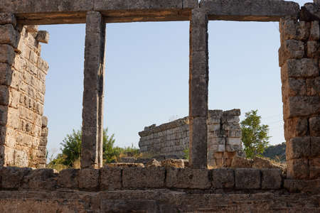 Roman ancient ruins Perge over a clear blue sky in Turkey, Antalya.の写真素材