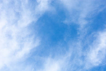 blue sky background. Sky with white clouds in springtimeの写真素材
