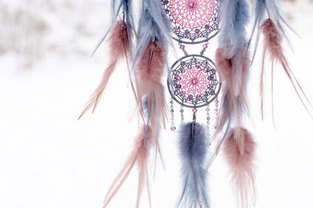 Dream catcher with feathers threads and beads rope hanging. Dreamcatcher handmadeの写真素材