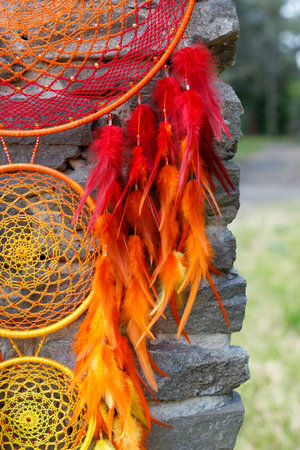 Dream catcher with feathers threads and beads rope hanging. Dreamcatcher handmadeの写真素材