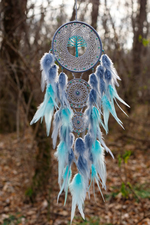 Dream catcher with feathers threads and beads rope hanging. Dreamcatcher handmade