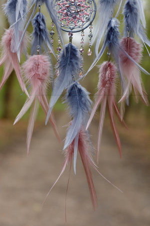 Dream catcher with feathers threads and beads rope hanging. Dreamcatcher handmadeの写真素材