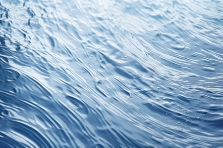 transparent blue clear calm water surface texture with splashes and bubbles.の素材
