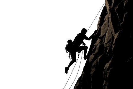 Silhouette of rock climber at sunset. outdoor sports and recreationの素材