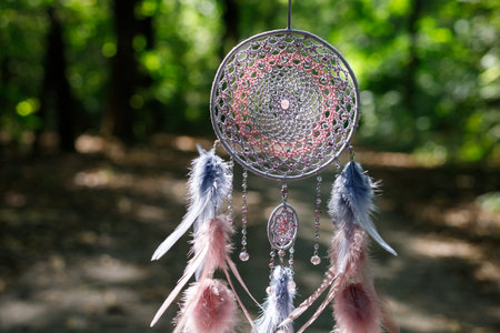 Dream catcher with feathers threads and beads rope hanging. Dreamcatcher handmade
