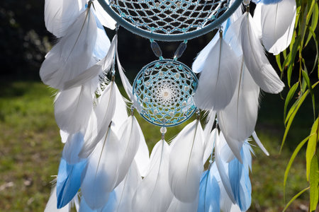 Dream catcher with feathers threads and beads rope hanging. Dreamcatcher handmadeの写真素材