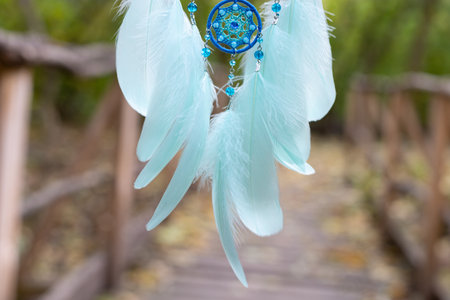 Dream catcher with feathers threads and beads rope hanging. Dreamcatcher handmadeの写真素材