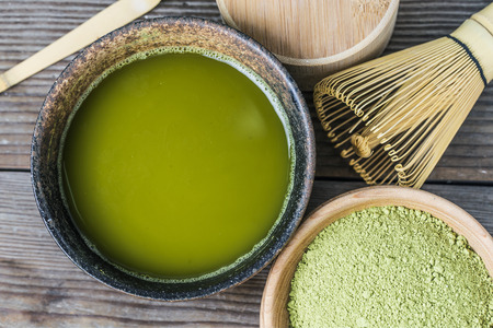 Wooden table of green teaの写真素材
