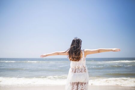 Women beside seaの写真素材