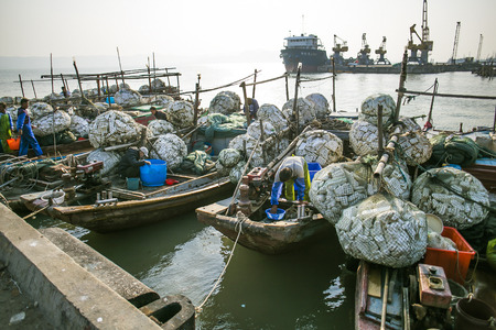 fisherman and fishing boatsのeditorial素材