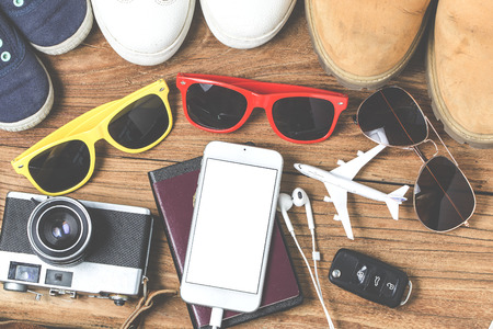 Children's and adult's sunglasses and shoes according and Target for travel,Travel Clothing accessories apparel along for the menの写真素材