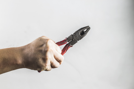 Man holding pliersの写真素材